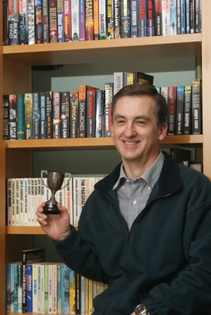 Author Ian Coates with prize winning cup that kept him motivated